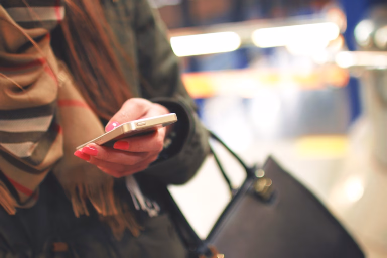 Woman Holding Smartphone